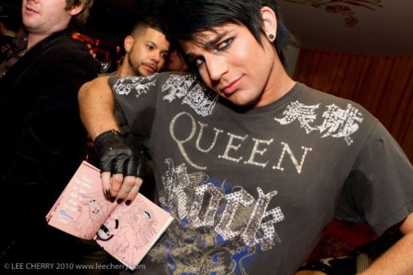 adamholdingbooklet.jpg