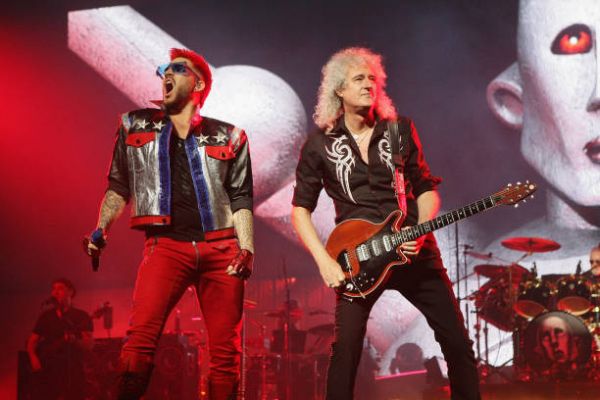 vocalist-adam-lambert-and-guitarist-brian-may-of-queen-adam-lambert-picture-id803725816.jpg